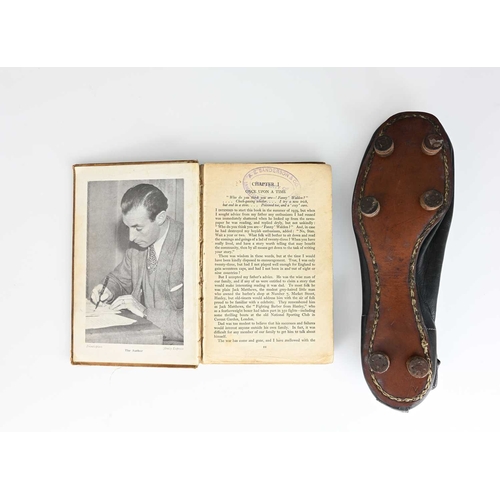 330 - Stanley Matthews, a leather football boot together with a copy of Feet First