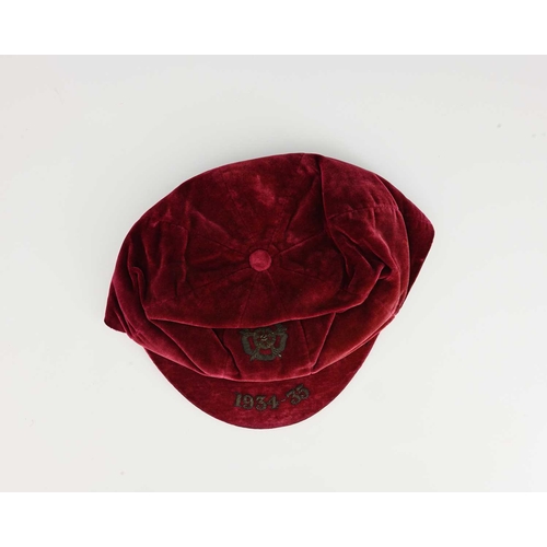 343 - Stanley Matthews, an England International football cap, 1934-35, red velvet embroidered in gold thr... 