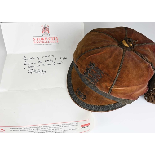 344 - Stanley Matthews, an England International Schoolboys football cap, 1929, red velvet with gold threa... 