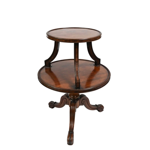 360 - A Regency mahogany dumb waiter, c.1820, two graduated revolving circular tiers, inverted reeded supp... 