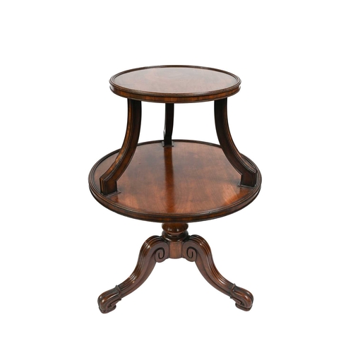 360 - A Regency mahogany dumb waiter, c.1820, two graduated revolving circular tiers, inverted reeded supp... 