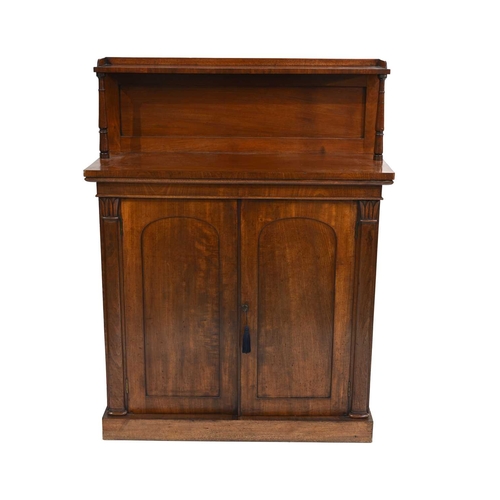 361 - A mahogany chiffonier, mid 19th century, raised panel back with a galleried shelf, ringturned suppor... 