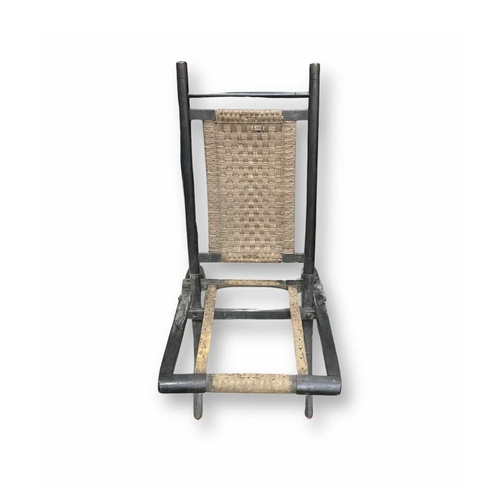 371 - An Arts and Crafts ebonised folding chair with rattan back, attributed to E. W. Godwin, 80 high, 42 ... 