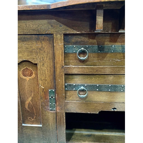 375 - Attributed to Shapland and Petter, an Arts & Crafts oak dresser, base with two central drawers over ... 