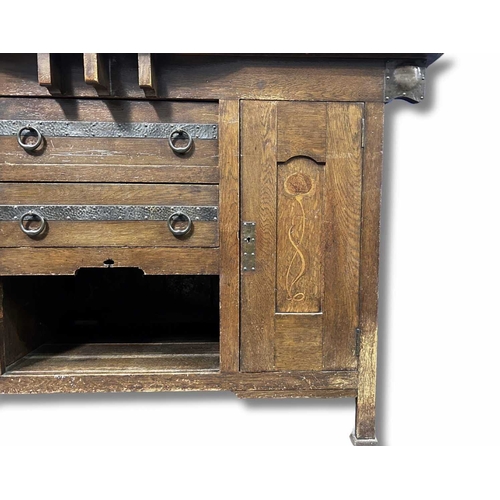 375 - Attributed to Shapland and Petter, an Arts & Crafts oak dresser, base with two central drawers over ... 