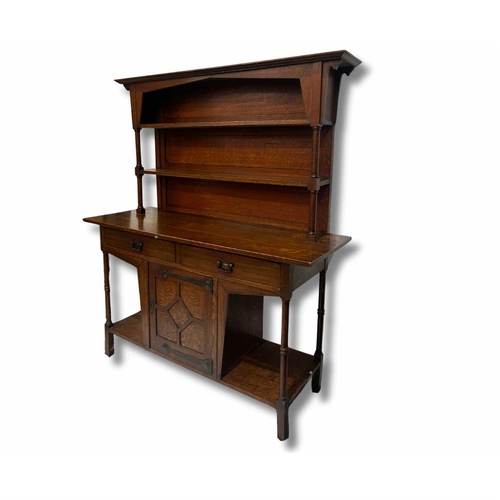 376 - Attributed to Shapland & Petter, an Arts & Crafts oak dresser, c.1890, with two drawers over one cen... 