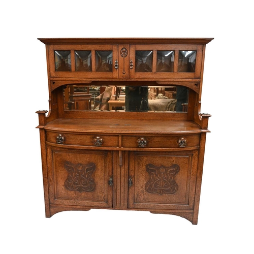 378 - An Arts and Crafts oak sideboard, circa 1905, raised back with plain cornice over twin cupboards wit... 