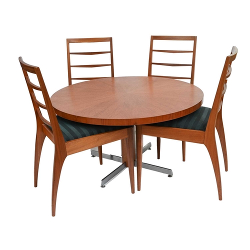 387 - McIntosh of Kirkcaldy, a mid-Century teak dining set, 1960's, comprising circular rise and fall dini... 