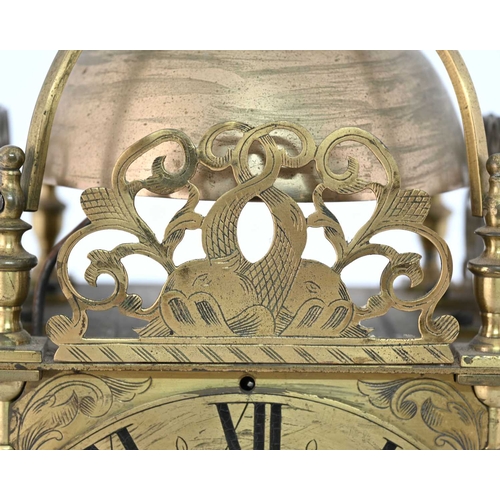 391 - A traditional brass lantern clock, 19th Century in the 17th Century style, urn finial, bell, fretwor... 