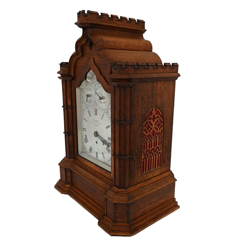 395 - Clerke, 1 Royal Exchange London, an oak bracket clock, 19th century, of Gothic Revival design, incor... 