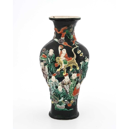 400 - A Chinese Famille Noir relief moulded figural vase, incised Kangxi vase, possibly of the period, fla... 