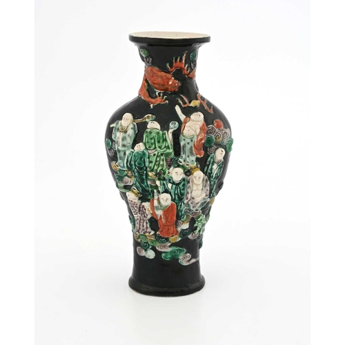 400 - A Chinese Famille Noir relief moulded figural vase, incised Kangxi vase, possibly of the period, fla... 