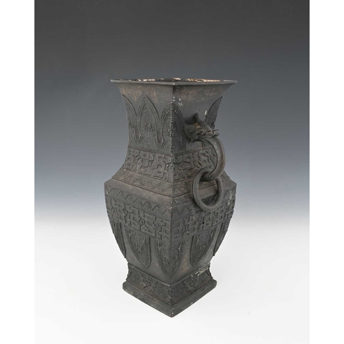 404 - A Chinese bronze vase, inverse baluster rectangular section, with zoomorphic ring handles, in the ar... 