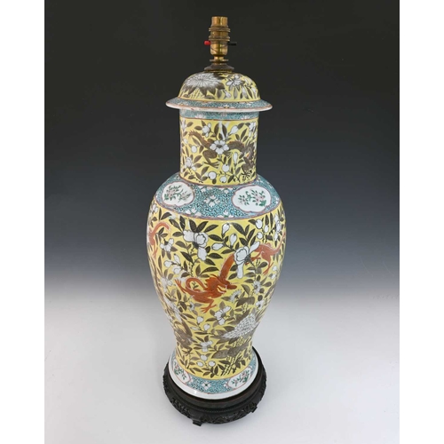 417 - A Chinese altar vase and cover, converted to a lamp, yellow ground with white carnation design, betw... 