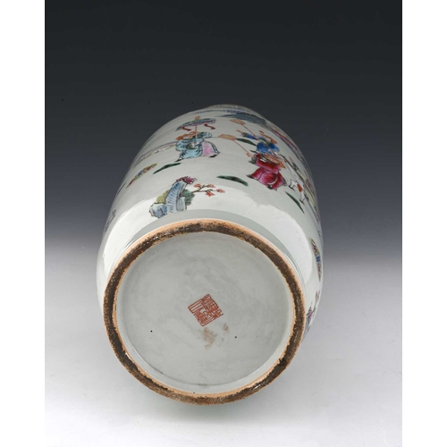 421 - A Chinese rolo shaped famille rose vase, painted in the round with courtly figures in a garden lands... 