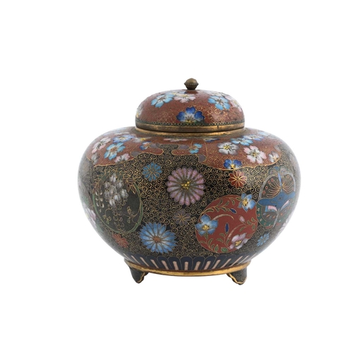 436 - A Chinese cloisonne koro, ovoid form with cover, decorated with chrysanthemums and peonies on a red ... 