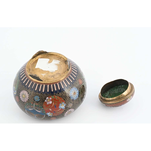 436 - A Chinese cloisonne koro, ovoid form with cover, decorated with chrysanthemums and peonies on a red ... 