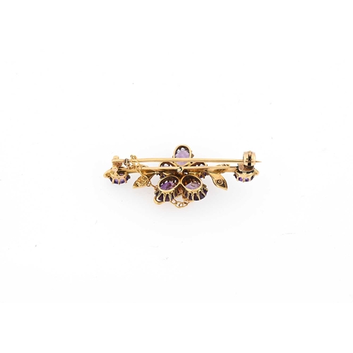 45 - An early 20th century 18ct gold amethyst and split pearl floral bar brooch, hallmarks for Birmingham... 