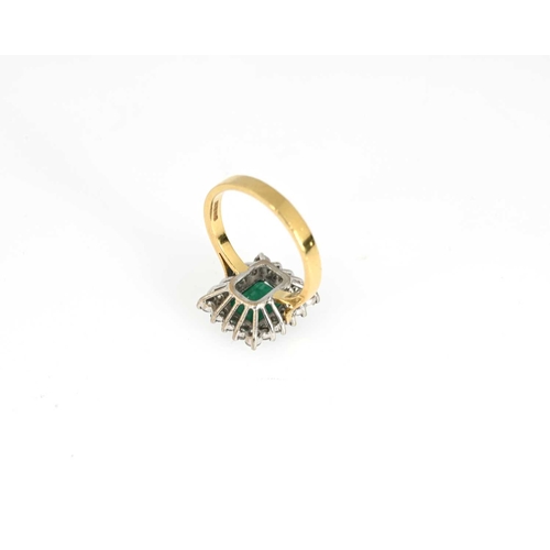 53 - An 18ct gold emerald and brilliant-cut diamond cluster ring, total diamond weight 0.80ct, engraved t... 