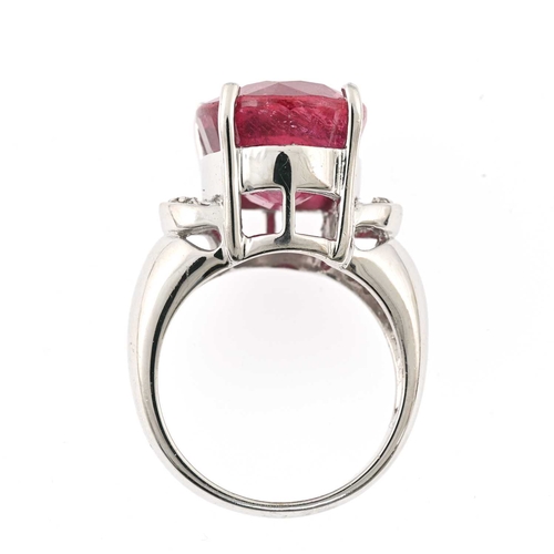 55 - An 18ct gold ruby single-stone dress ring, with single-cut diamond accent shoulders, ruby estimated ... 