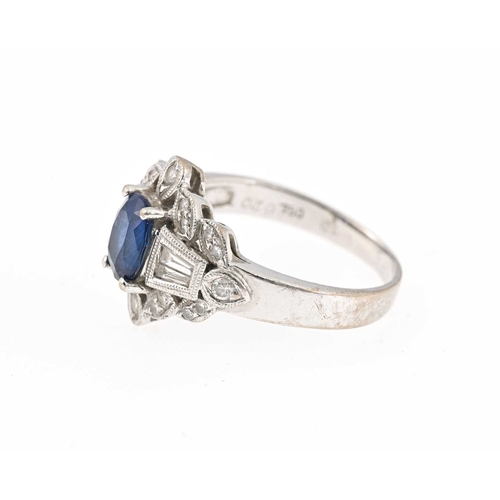 56 - An 18ct gold sapphire and vari-cut diamond dress ring, sapphire weight 0.94ct, total diamond weight ... 