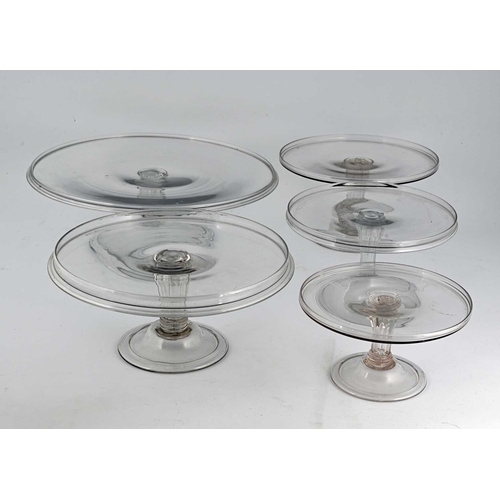 631 - A George II clear glass tazza pyramid, circa 1750, comprising five graduated circular tiers with gal... 