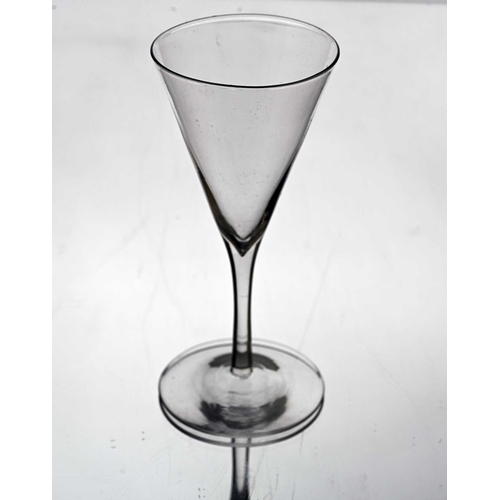 648 - Harry Powell for James Powell and Sons, Whitefriars, an Arts and Crafts wine glass, circa 1890, coni... 