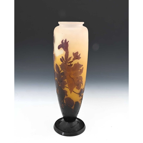 661 - Emile Galle, a triple cased cameo glass trumpet flower vase, circa 1890, footed shouldered form, aub... 