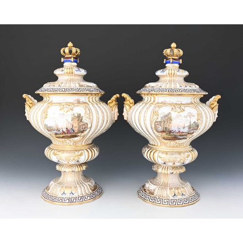 682 - A large pair of Meissen style Dresden vases and covers, twin handled double ogee urn form with mask ... 