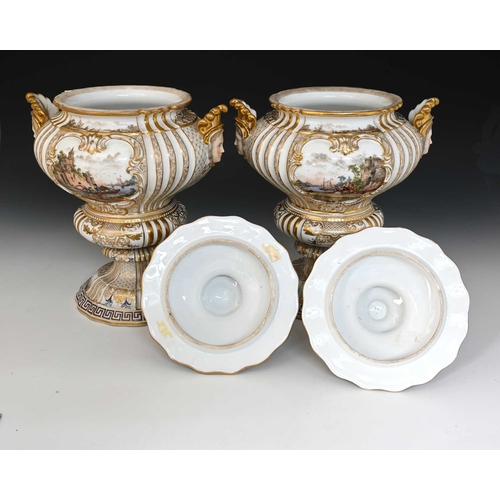 682 - A large pair of Meissen style Dresden vases and covers, twin handled double ogee urn form with mask ... 