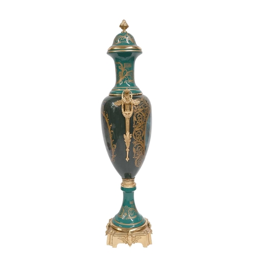 683 - A very large Continental vase, in the Vienna style, twin handled pedestal urn form, with ormolu type... 