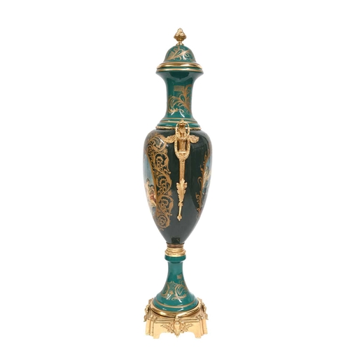 683 - A very large Continental vase, in the Vienna style, twin handled pedestal urn form, with ormolu type... 