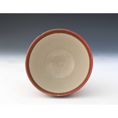 684 - Ulisse Cantagalli, a Hispano Moresque red lustre footed bowl, circa 1890, rounded form on splayed co... 