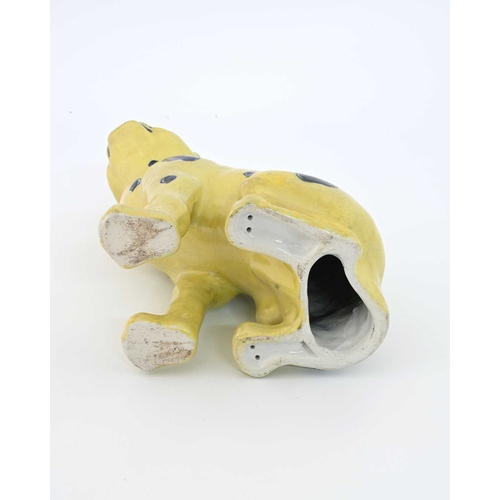 690 - A faience figure of a pug dog, in the Mosanic/Galle style, modelled sitting upright, yellow ground w... 