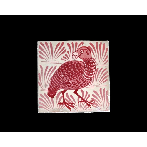 707 - William De Morgan, an Arts and Crafts ruby lustre Partridge tile, Chelsea, circa 1880, painted with ... 