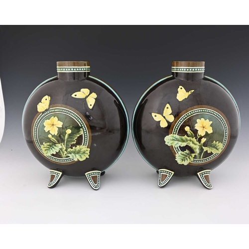 713 - Florence Lewis for Doulton Lambeth, a pair of large faience painted moonflask vases, circa 1883, the... 