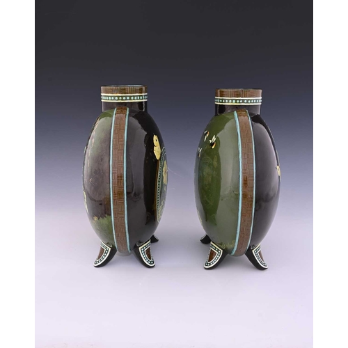 713 - Florence Lewis for Doulton Lambeth, a pair of large faience painted moonflask vases, circa 1883, the... 