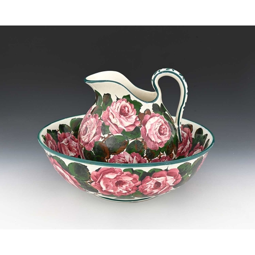 717 - Wemyss for Thomas Goode, a cabbage rose painted large jug and bowl, early 20th century, ovoid helmet... 