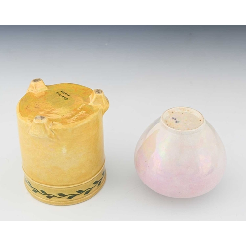 721 - Ruskin Pottery, two vine painted lustre vases, circa 1918, shouldered ovoid form in pink draining to... 