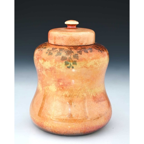 733 - Ruskin Pottery, an Ivy painted Lustre jar and cover, 1909, squat double gourd form, orange ground, i... 