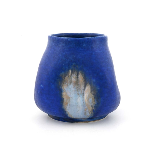 739 - Ruskin Pottery, a Crystalline vase, 1927, dimpled squat baluster form, matte blue with patches of pa... 