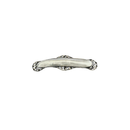 74 - An Arts and Crafts silver and blister pearl brooch, with open leaf and tendril border, 10.5cm long, ... 