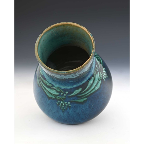 754 - Ruskin Pottery, an early vine painted Souffle glazed vase, circa 1900, conical baluster form with cy... 