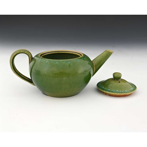 755 - Ruskin Pottery, a Souffle and slip decorated teapot, circa 1900, quat ovoid form, green tocky glaze ... 