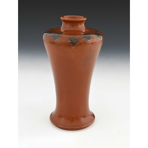 756 - Ruskin Pottery, a Vine painted Souffle glazed vase, circa 1905, Meiping form, brown with blue grape ... 