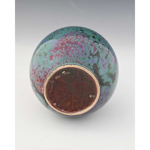 778 - Ruskin Pottery, a High Fired vase, 1922, bulbous form, mottled green and purple oxide over sang de b... 