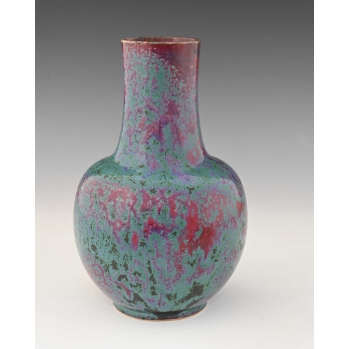 778 - Ruskin Pottery, a High Fired vase, 1922, bulbous form, mottled green and purple oxide over sang de b... 