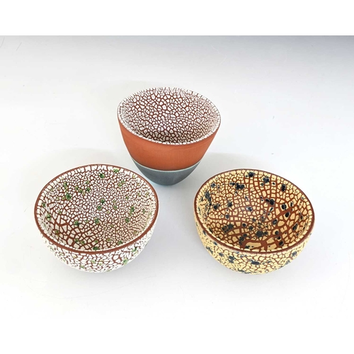 786 - Emma Williams (British, 20th/21st Century), three textured earthenware bowls, largest 9.5cm diameter... 