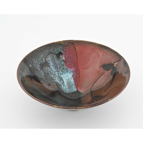 792 - Margaret Frith (British, 1943), a porcelain bowl with various poured glazes and a floral brushed mot... 