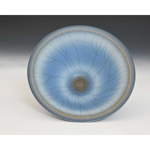 795 - David White (British, 1934-2011), a wide/ low porcelain bowl, decorated with blue, soft grey, and ta... 